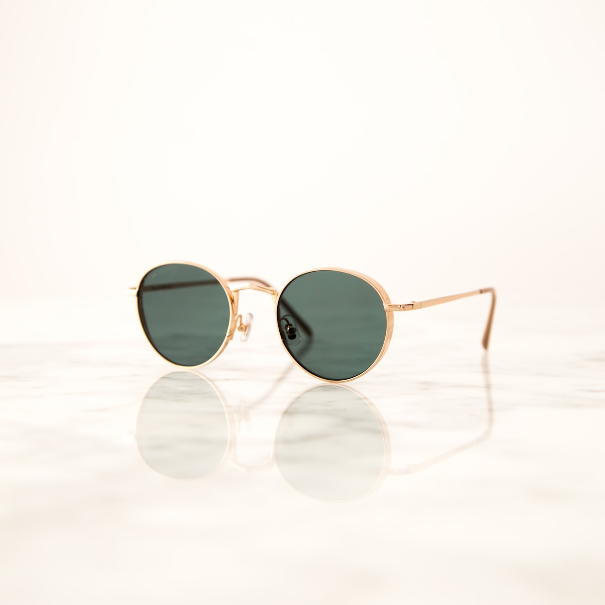 gold framed aviator style sunglasses